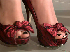 Pretty Italian girl tries on her new high heels for Christmas