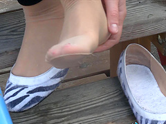 Trip to the park with a cute girl for a bit of foot fetish play