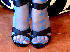 Foot fetish girl puts on sexy sheer socks and high heels
