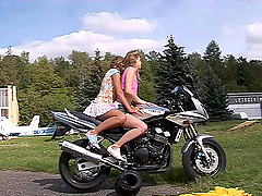 Sweet lesbians outdoors in the sun for hot sex