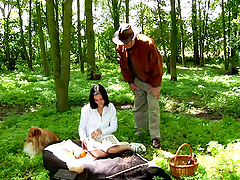 Girl walking her dog in the woods meets an old guy to fuck