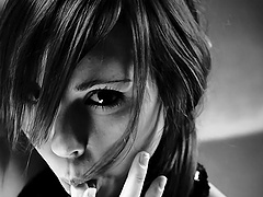 Black and white porn video of petite brunette Ariel Rebel teasing