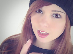 Redhead slut Ariel Rebel gets naked and teases while looking at camera