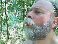 Mature guy with a stiff dick pleasured in the forest by Michaela Q