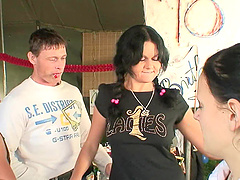 Lustful Michelle is on one boner while sucking another one hard