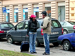 Babe in a leather corset Tera Joy on her knees sucking two cocks