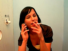 Renata grabs a dick coming from a glory-hole to suck it hard