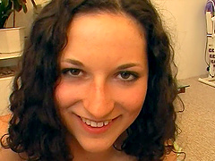 Curly haired Kin drops on her knees to give a sloppy blowjob