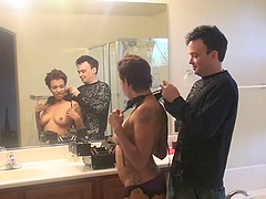 Tattooed brunette takes in a white cock in a bed sex action