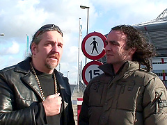 Tattooed cowgirl in a bikini giving a thrilling blowjob in a reality shoot