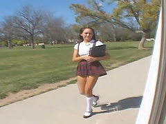 Naughty brunette dame in a miniskirt has a big cock in her bald cunt