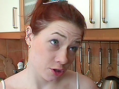 Quickie fucking in the kitchen ends with a facial for redhead Katerina