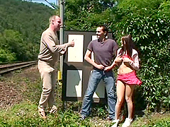 Outdoor threesome fucking with two guys and stunning Lucie