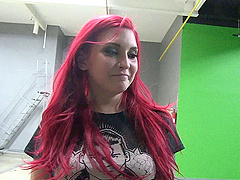 Three porn actresses being interviewed on their sets