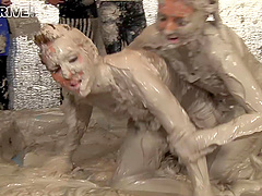 Dirty catfight in a mud pit with horny glamour girls. HD video