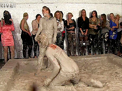 Dirty catfight in a mud pit with horny glamour girls. HD video