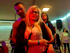 Group sex during a large party with clothed females and male strippers