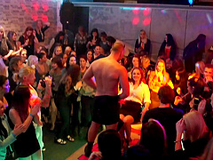 Group sex during a large party with clothed females and male strippers