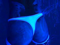 Black light body paint play with a babe in white lingerie