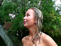 Stunning blonde Kasia gets naked and sprayed down with a hose