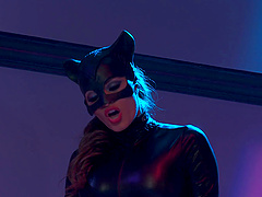 Leather-clad dominatrix with a stunning body getting her pussy licked