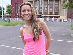 Long hair Nessy in Shorts posing seductively in an interview