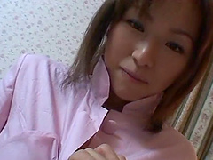 Lingerie-clad Asian chick with a fantastic body sucking a stranger's cock