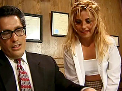 Horny principal fucks her steamy student in this office sex action