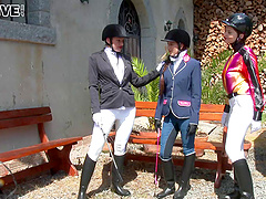 Naughty lesbian babes show off their nice asses outdoors