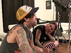 Brunette punk poses seductively in an enticing photo shoot