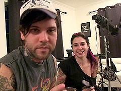 Brunette punk poses seductively in an enticing photo shoot