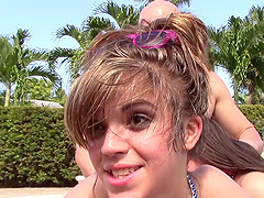 Horny American chicks having a nice threesome by the pool