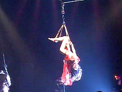 Dirty girl tied up and fucked on the stage in front of people
