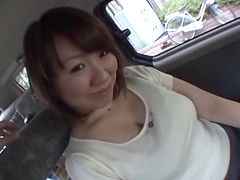 Busty Asian mature spreads her legs to be fucked in the car