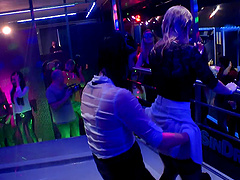 Lesbian club gets erotic with alluring chics dancing in a raining podium