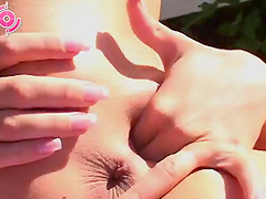 Outdoors fingering adventure of a pretty blonde with cute boobs