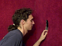 White guy sucks off a hard dick at the gloryhole