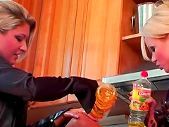 Nika and her sexy blonde bae play in a kitchen in a very sexy way