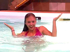 Bikini babe with wonderful titties swims in the pool