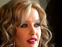 Stunning Sophie Moone poses in red bodysuit and toys herself