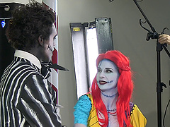 Sexy chick in a scary costume revealing her trimmed twat