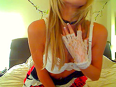 Busty blonde gets on the couch and exposes her breathtaking body