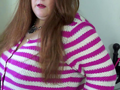 Fatty in black stockings and a bustier fucks a dildo