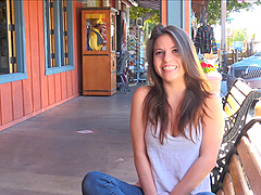 Perky titties pop out of her tank top in a public tease