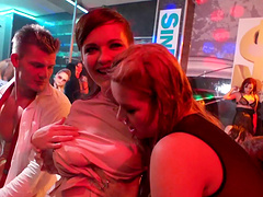 Party girls cheering as they fuck and suck guys at a club