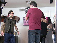 Tattooed goth babe spreads her legs and teases her clit