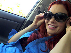 Sexy redheaded girl looks amazing in a miniskirt