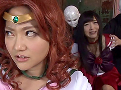 Stirring Japanese chicks in costumes having fun with their partners