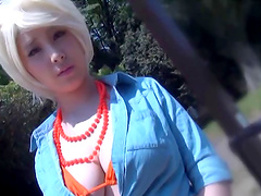 Blonde wig and an orange bikini on a curvy Asian slut