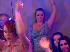 Ladies cheering as their friends blow the strippers